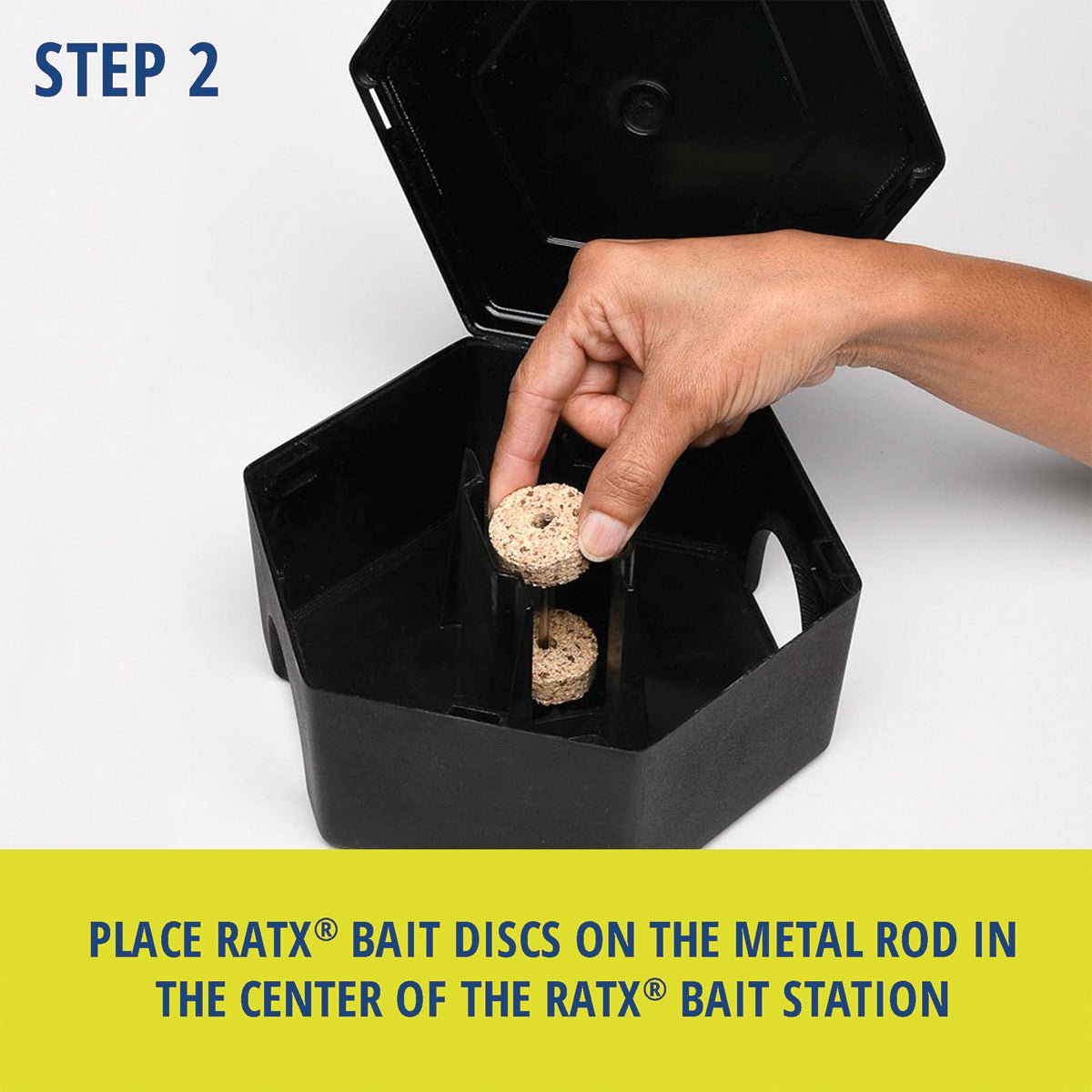 RatX® Small Bait Box. Step 2: Place RatX® Bait Discs on the metal rod in the center of the RatX® Bait Station